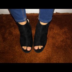 Black ankle boots with straps